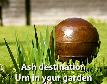 Cremation urn placed in a garden memorial setting