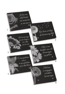 Memorial stone with several flower themes