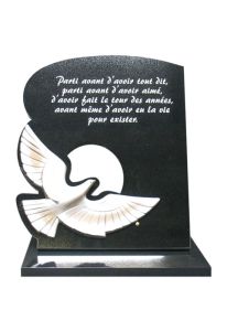 Memorial stone with white dove