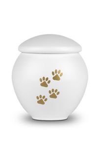 White pet urn with gold coloured paws