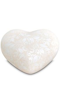 Half-standing heart cremation urn for ashes with floral motif from the Love Collection