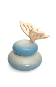 Handmade baby cremation urn with wooden butterfly