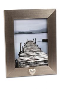 Photo frame with small heart for cremation ashes