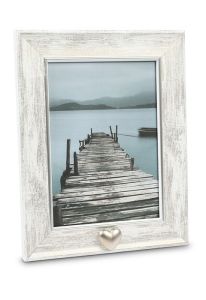 Photo frame with small heart for cremation ashes