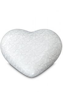 Half-standing heart cremation urn for ashes with matte platinum-colored leaves