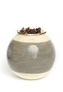 Ceramic funeral urn with silver heart