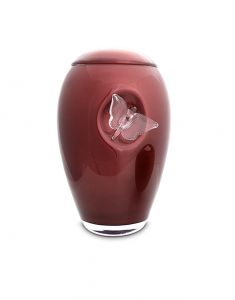 Burgundy red glass cremation urn with butterfly