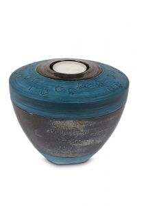 Handmade pet urn with paw prints and candle holder