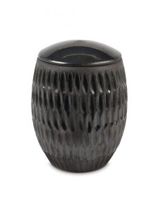 Bronze-colored ceramic urn for ashes