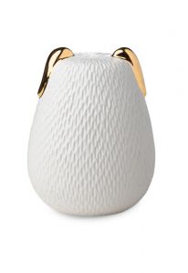 Dog urn for ashes with gold coloured ears