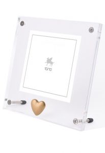 Acrylic glass photo frame with heart shaped keepsake urn for ashes