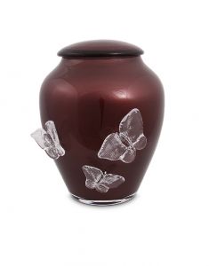 Burgundy coloured crystal glass cremation urn with butterflies