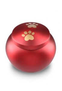 pet urn for ashes matte red with 2 gold-coloured paw prints in various sizes