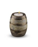 Ceramic keepsake cremation ashes urn with a candle